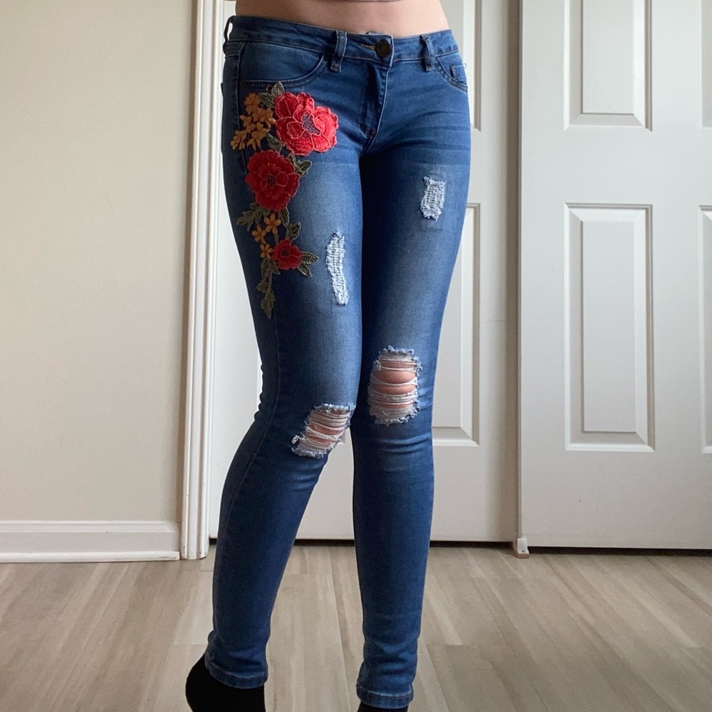 Embroidered Blue Jeans with Floral Design